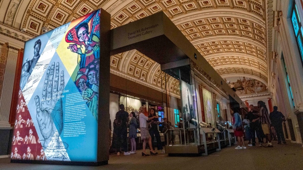 People visit the exhibit, 'Collecting Memories: Treasures from the Library of Congress,' during a media preview at the Library of Congress in Washington. (Jacquelyn Martin/AP)