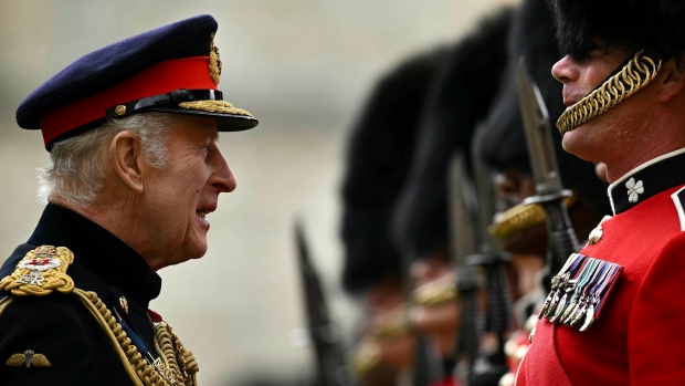King Charles, speaks as he reviews the Irish Guards, during a ceremony at Windsor Castle. (Ben Stansall/AP)